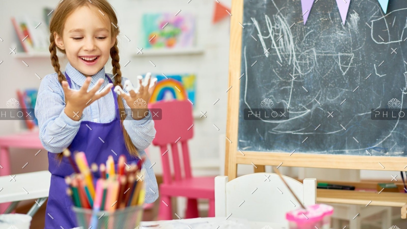 demo-attachment-1016-cute-girl-playing-with-paint-in-art-class-85QTUD9-e1589448274786